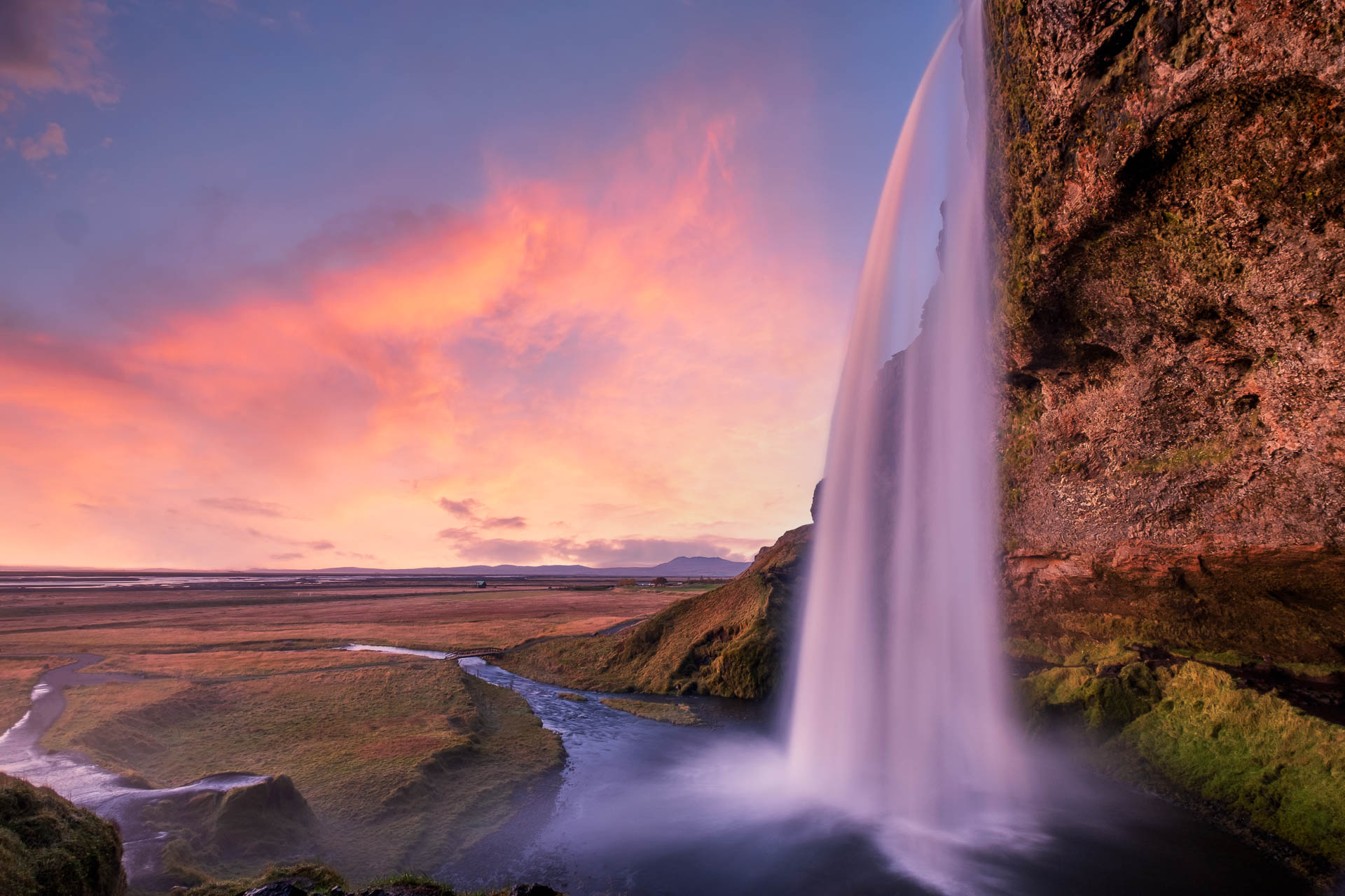 Sunset at Seljalandsfoss waterfall in Iceland