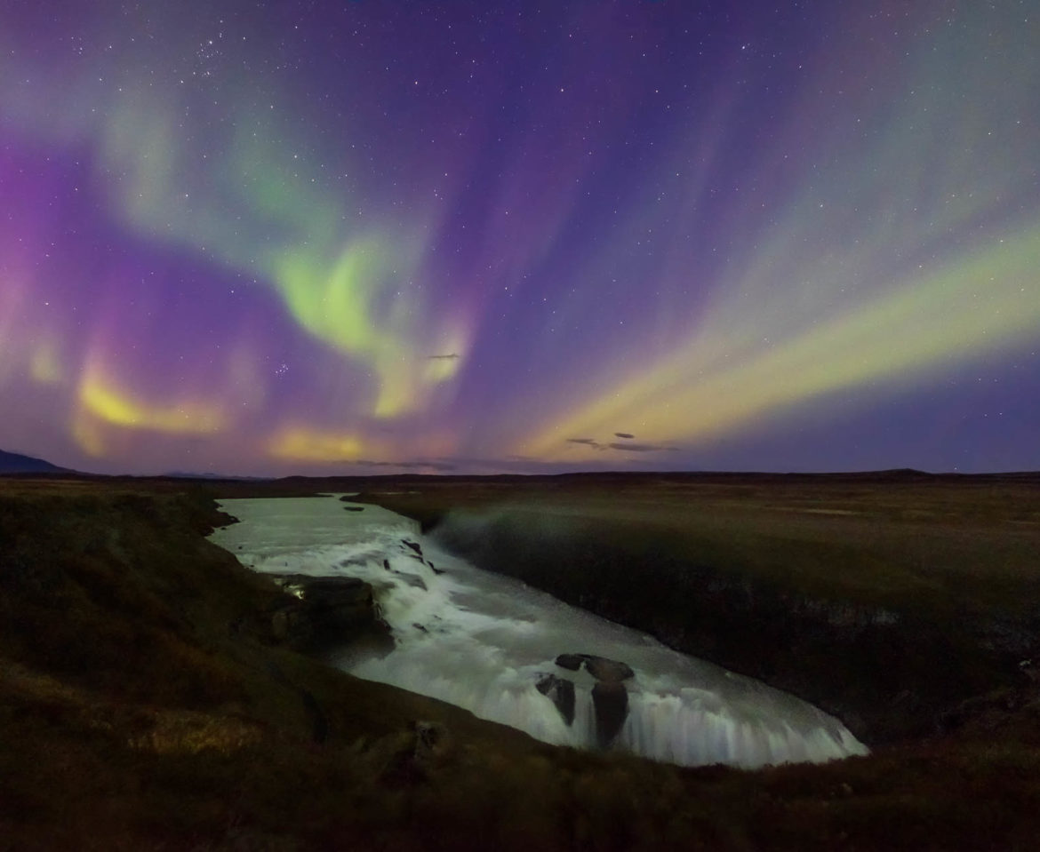 Aurora Borealis over Gullfoss waterfall in Iceland