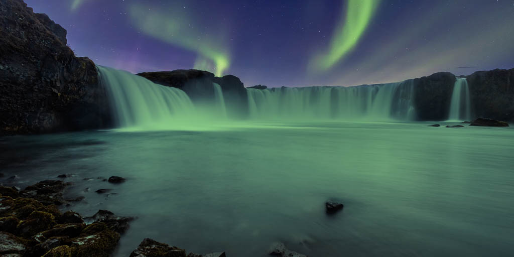 Aurora Borealis over Godafoss waterfall in Iceland - Alexios