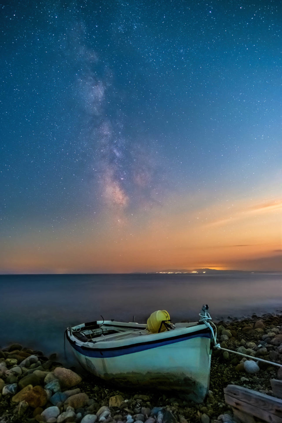 A fishing boat under the milky way