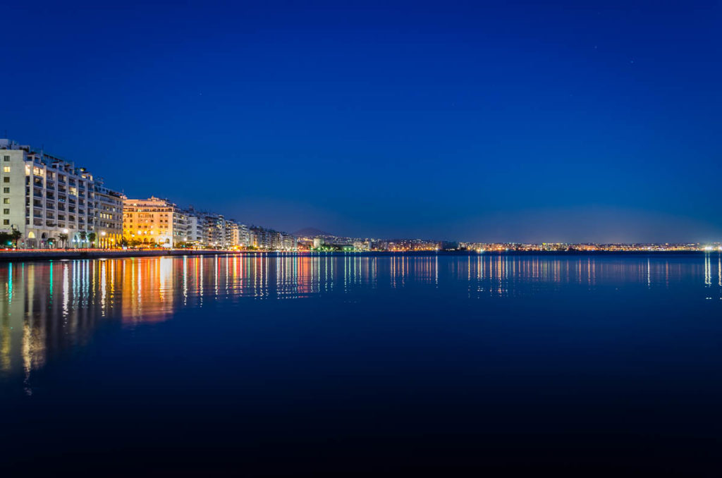 Reflection of Thessaloniki city in Greece during the blue hour