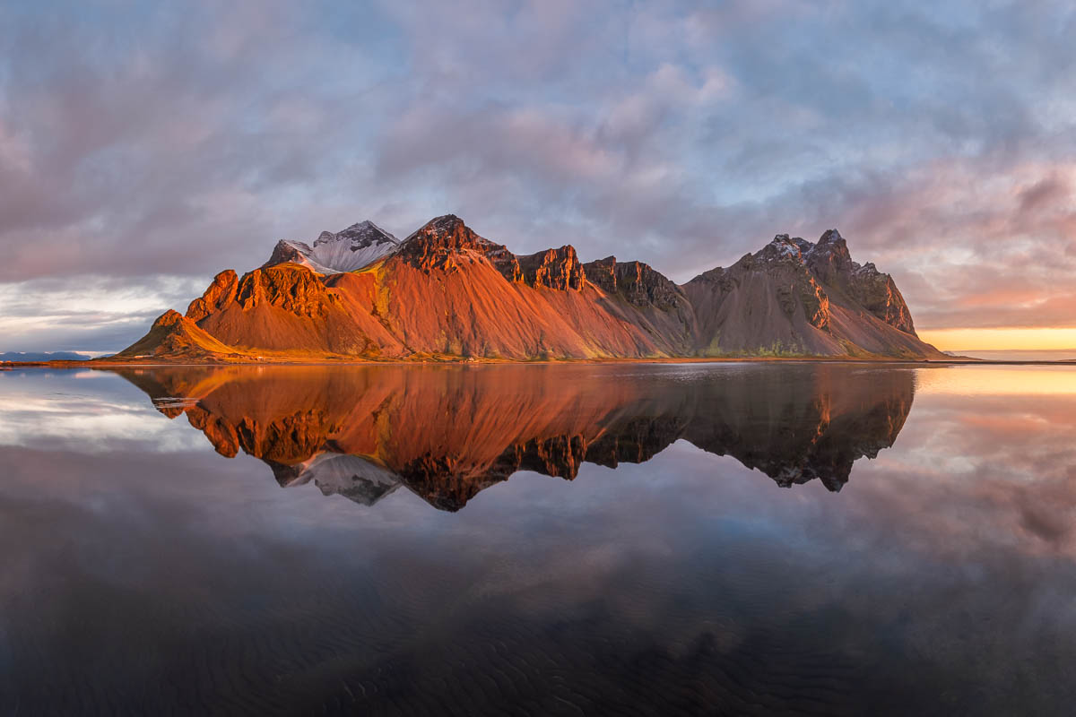 Reflection of Vestrahorn Mountain in Iceland at Sunrise