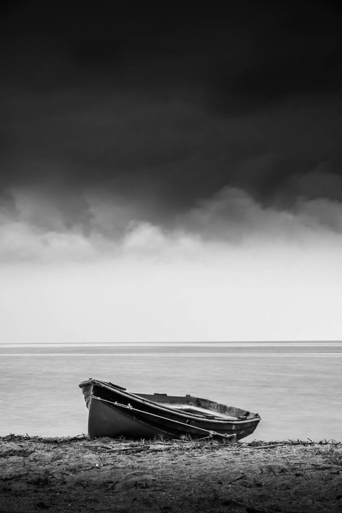 Fishing Boat on the Shore in Black and White